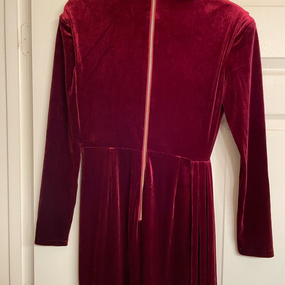 Velvet burgundy long gown with a spilt on the right side.  Never worn